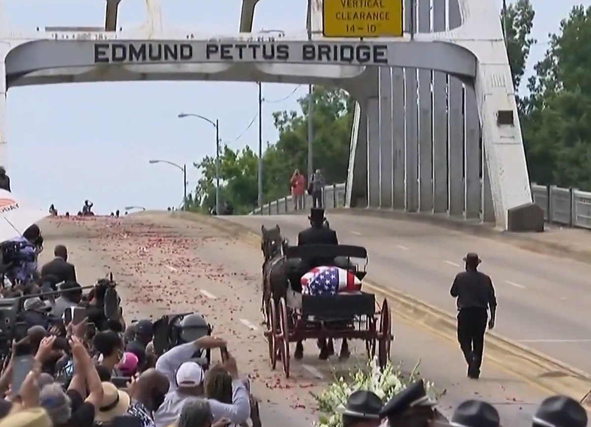 ChazBeasley's tweet photo. John Lewis crosses the bridge in Selma one last time. 

A fitting tribute to an exceptional human being. https://t.co/GVKiOto4Sy