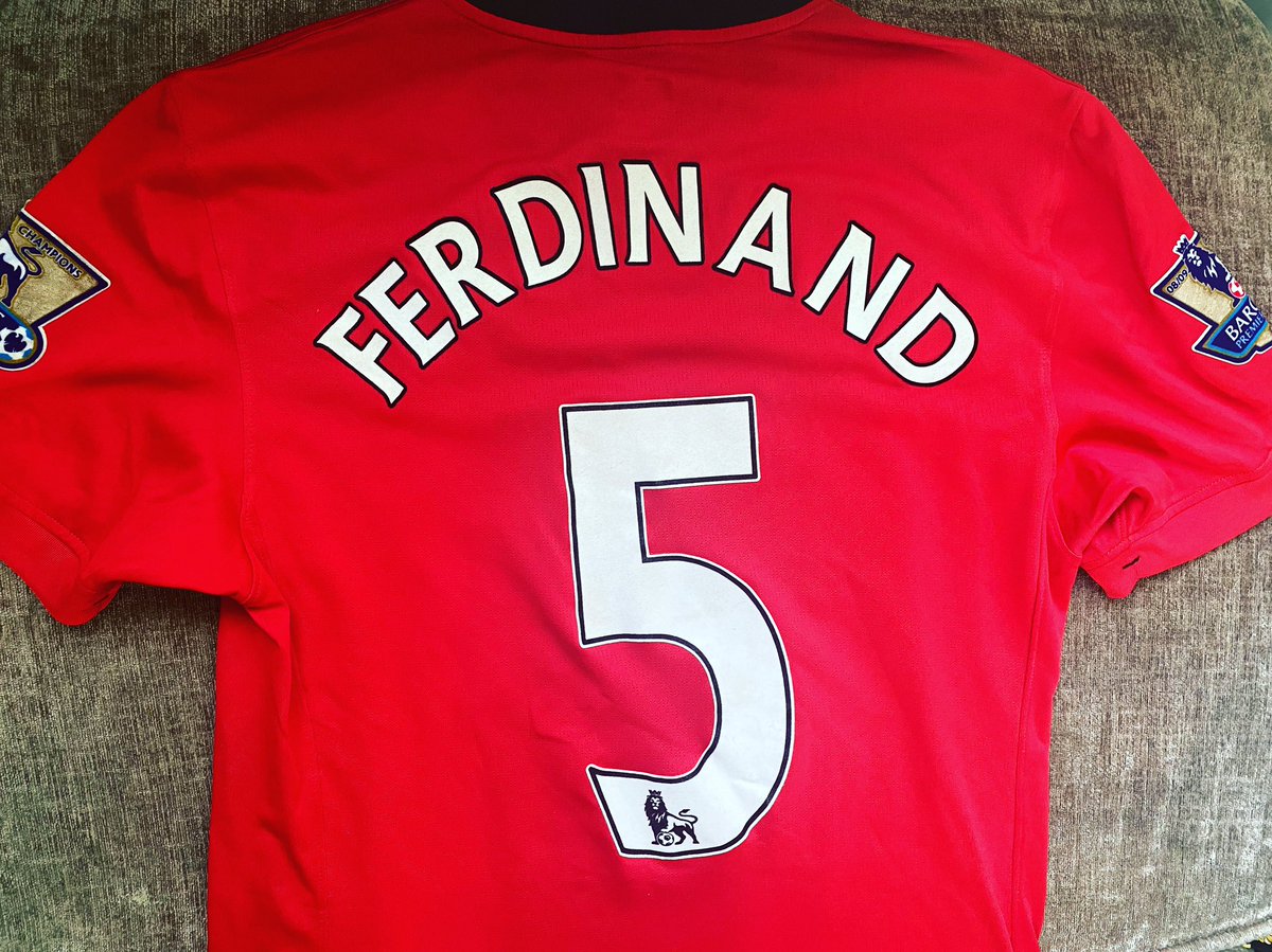 dis_boi_dre's tweet photo. My moms partner just gave me this. It’s from 08/09 season. Buzzing Rio my favourite United. Any chance to get this signed so can frame and hang it up @rioferdy5 https://t.co/rRj9zF2qZE