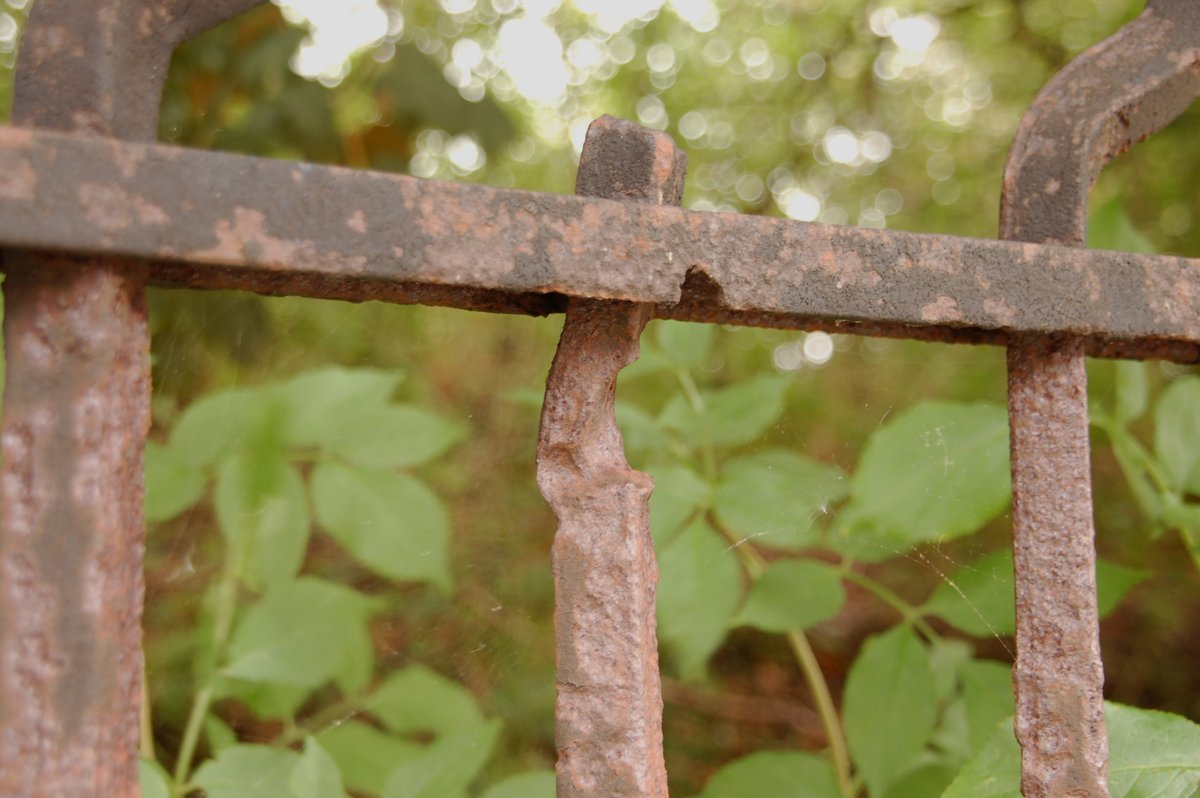 The pencil mark shows where the fourth bomb fell. The one near the gas holder didn't explode. The railings that used to mark the Works boundary are now along the cycle path through the Hawksworth industrial estate and still show the bomb damage.