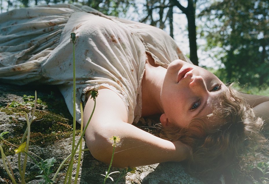 i went from hating walking around barefoot outside in the safe &amp; sound video to having a legit whole photo shoot where i just lay around on the ground. times change. ✨