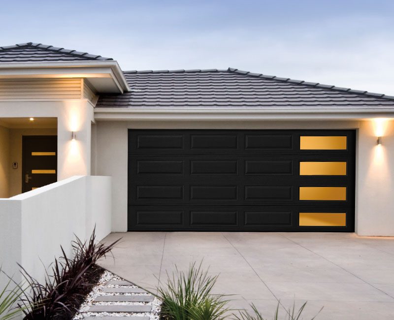 WindowBoston's tweet photo. Garage door peek-a-boo windows in luxe black, accent lights, and a calm modern design. Welcome home. https://t.co/UxIPG0Ovnd https://t.co/h9a6srpmXb