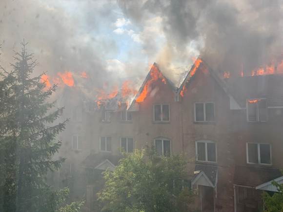 CP24's tweet photo. Fire crews battle large fire at townhouse complex in Richmond Hill https://t.co/4O1nLBDpNp https://t.co/EW0duyeSVI
