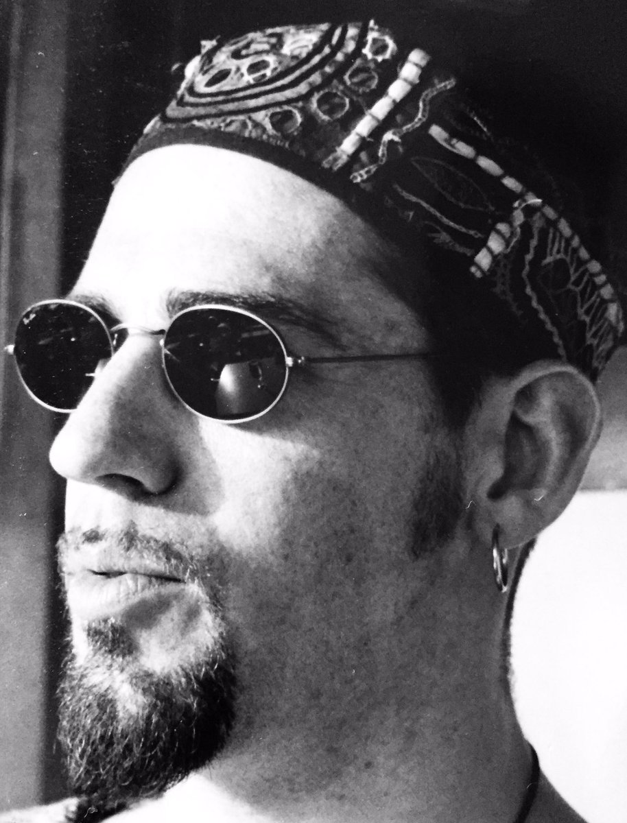 Hatdandy's tweet photo. OLD SKOOL NELLYTHEHAT
.
Liking the hippie mystic east slacker vibe from way back when..... #Barcelona 1995 first trip abroad  with Mrs NTH - still got that bucket hat!! #Hatdandy #hat #hats #cap #caps #mirrorcap #buckethat #1990s #Barcelona #rayban #goatee #beard #youngerself https://t.co/HMtQGZ2aCg