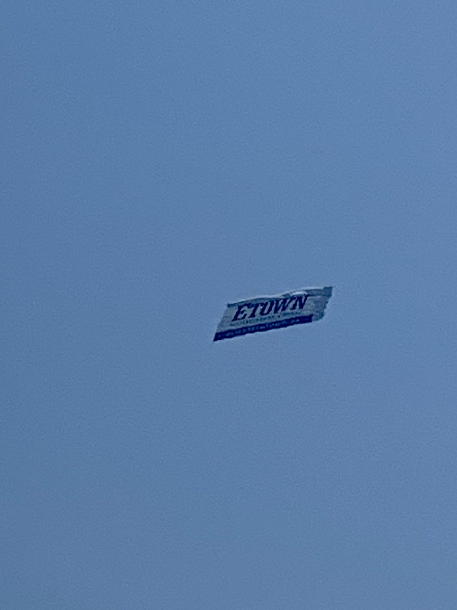 mwsutt's tweet photo. @EtownCollege Hey Etown a few weeks ago @DMS5169 and I were on the beach in Brigantine, NJ and the Etown banner came by. I got a picture of it and of Den and I on the beach. Aren’t we supposed to get a shoutout or some swag? #etownstrong#bluejays#1991grads https://t.co/IulGKnJP2H