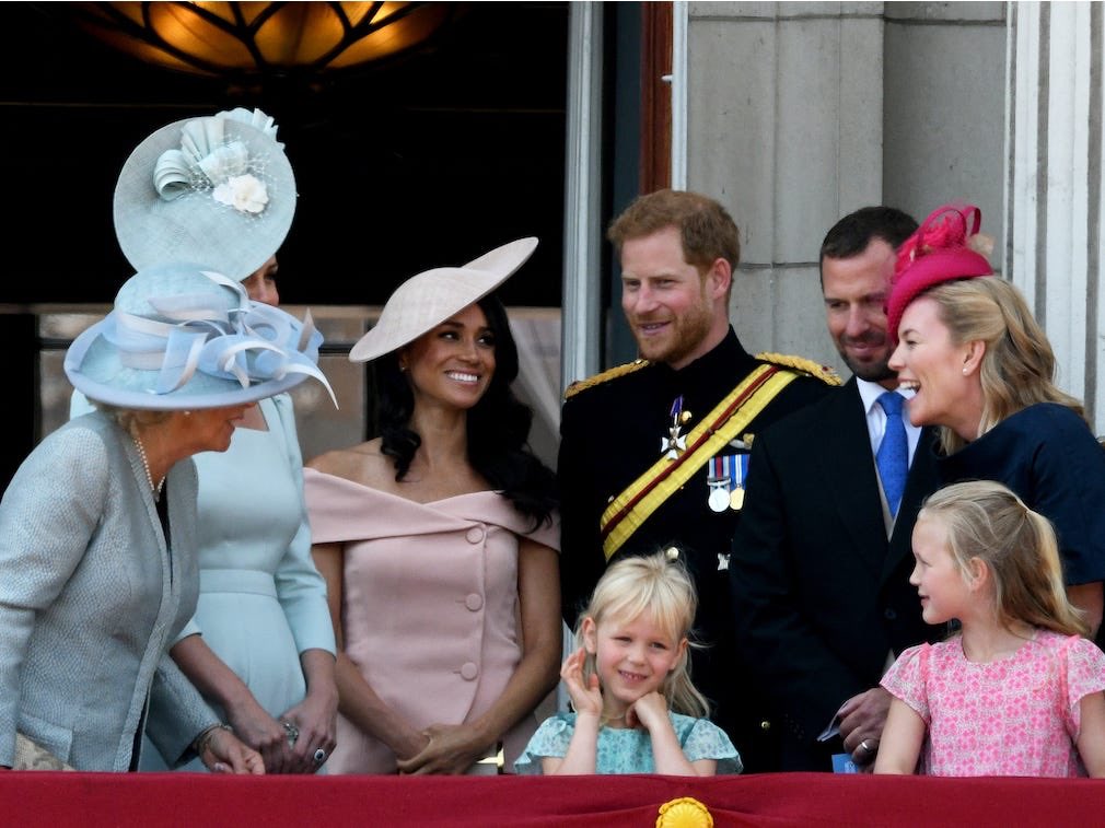 6. Meghan appears to be involved in conversation with everyone during trooping the colour 2018. If everyone hated her and she hated everyone, why are they all laughing and smiling here?