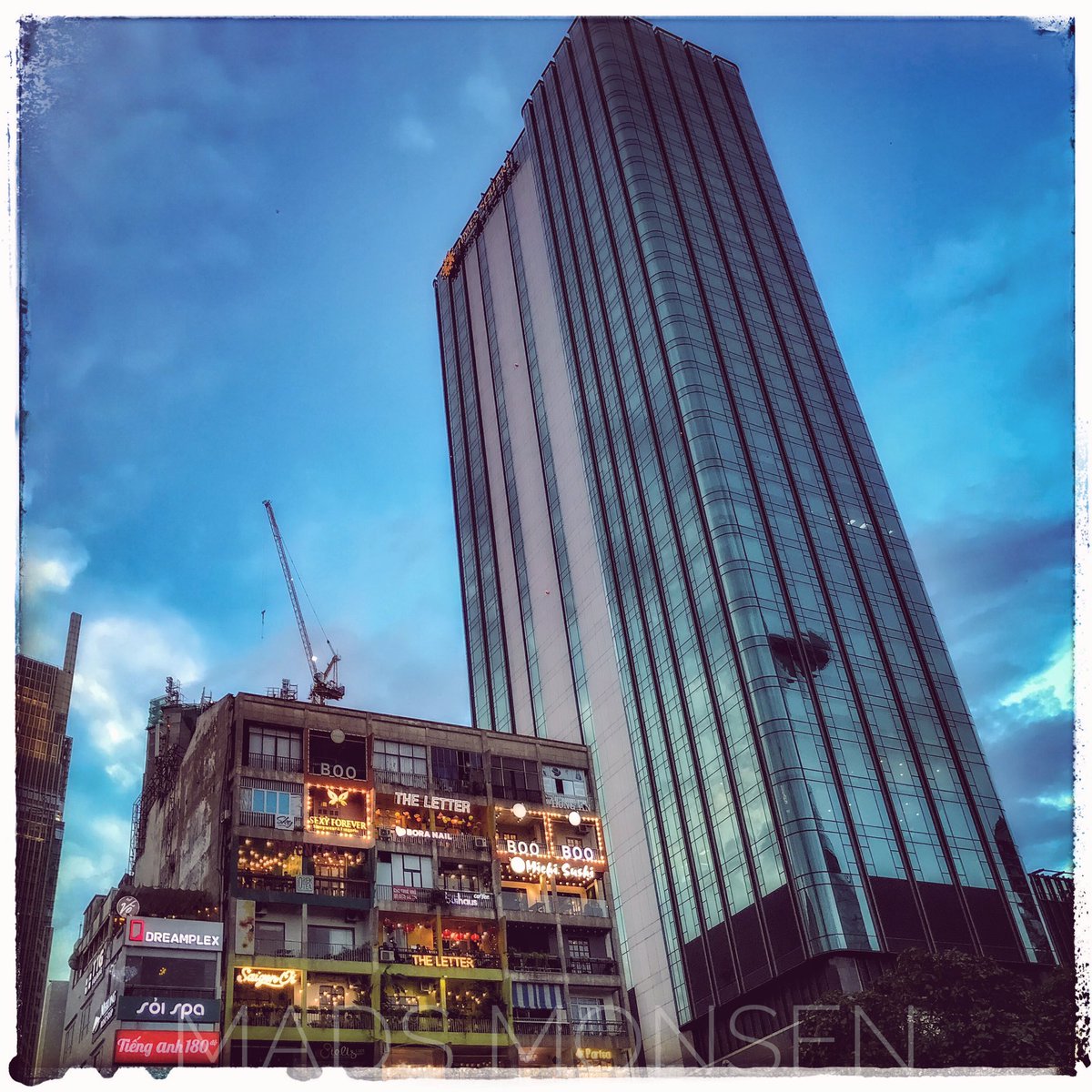 madsmonsen's tweet photo. Downtown Saigon. The old apartment building converted into coffee shops. #nguyenhue #saigon #iphonography #vietnam #architecture #coffeeshop https://t.co/xwp2JgdHJC
