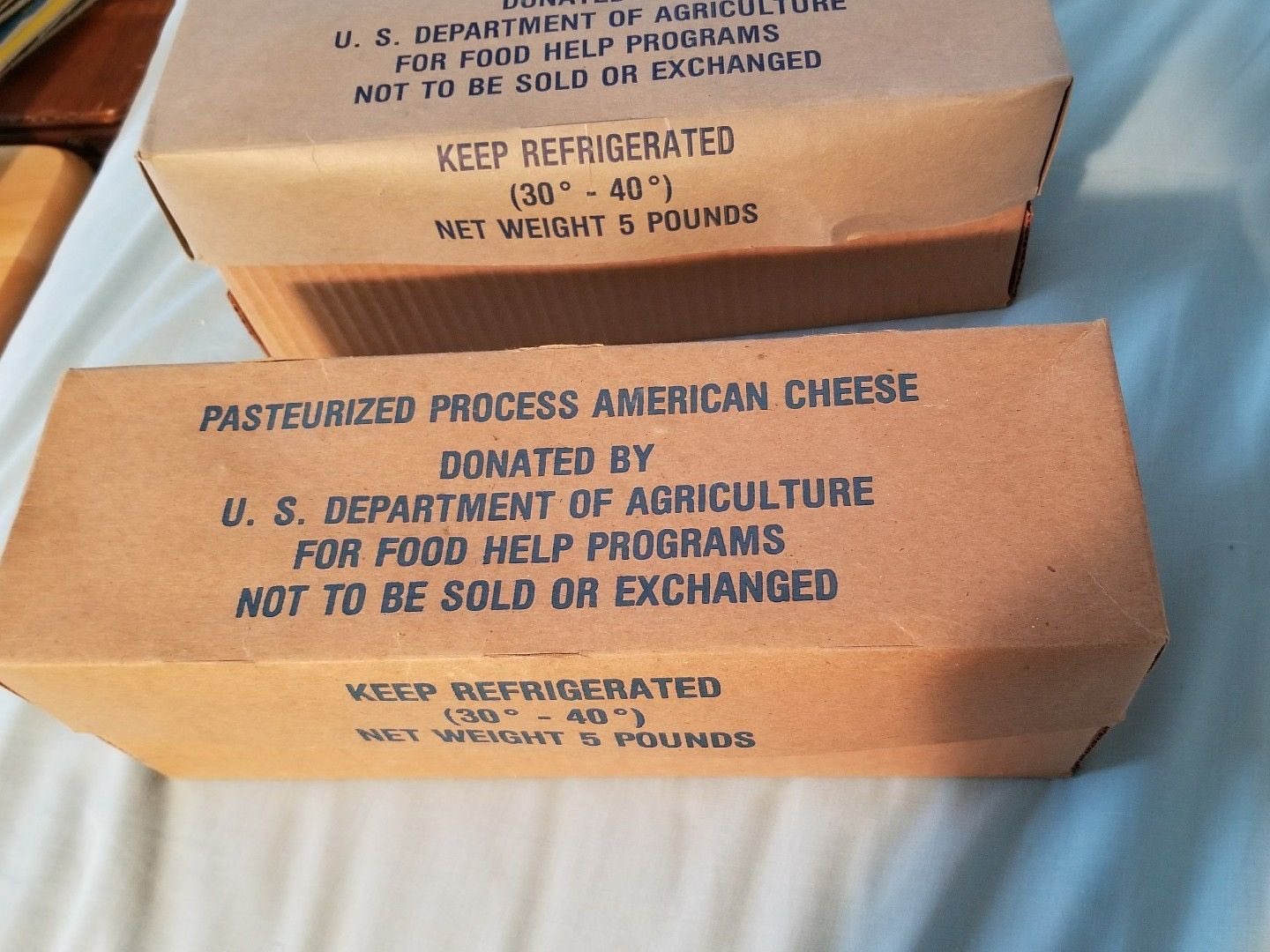 Mikel Jollett on X: For those asking, “What is government cheese?” It was  basically a 5 pound block of orange rubber the government gave to people on  food stamps because they the