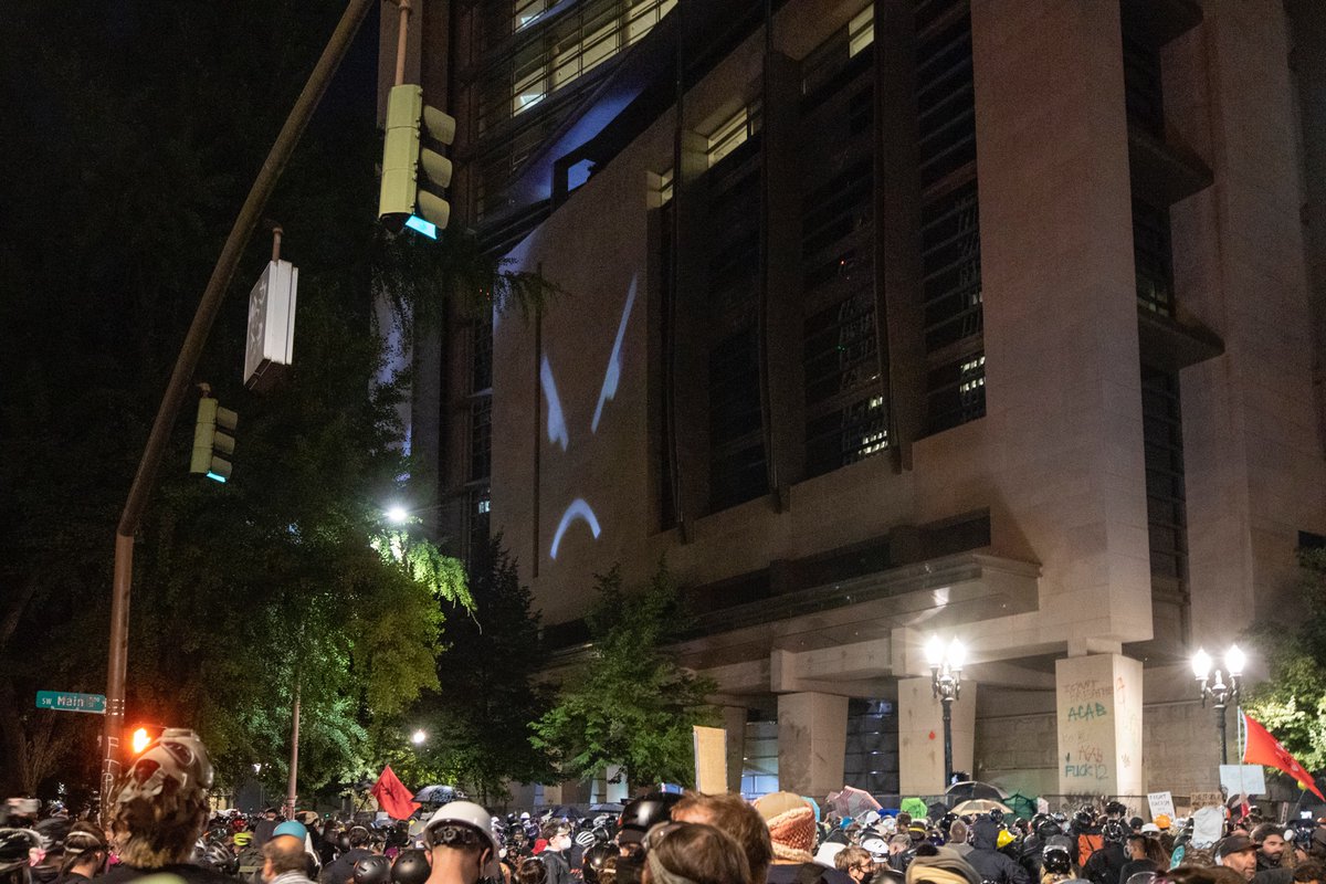 I wasn’t at the earlier march, but  @PDXzane was there. When I arrived at the FC, the crowd was large and energetic. A couple of my visual favorites were the CLAWS flag and the angry frown face.