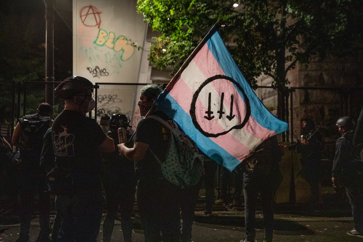 I wasn’t at the earlier march, but  @PDXzane was there. When I arrived at the FC, the crowd was large and energetic. A couple of my visual favorites were the CLAWS flag and the angry frown face.