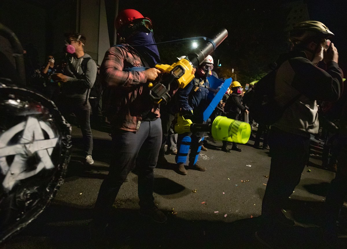 I wasn’t at the earlier march, but  @PDXzane was there. When I arrived at the FC, the crowd was large and energetic. A couple of my visual favorites were the CLAWS flag and the angry frown face.