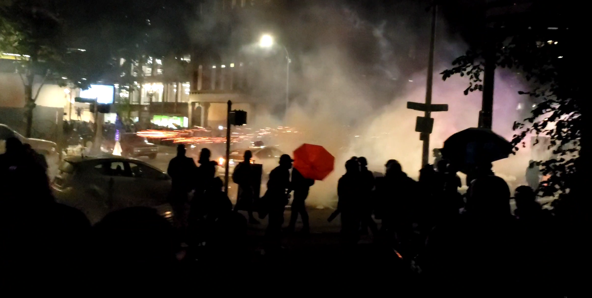 This was the strongest show of force that I’ve seen. Tear gas canisters were shot out all over the place, along with other less than lethal munitions zipping through the crowd in a dark Lownsdale Square.