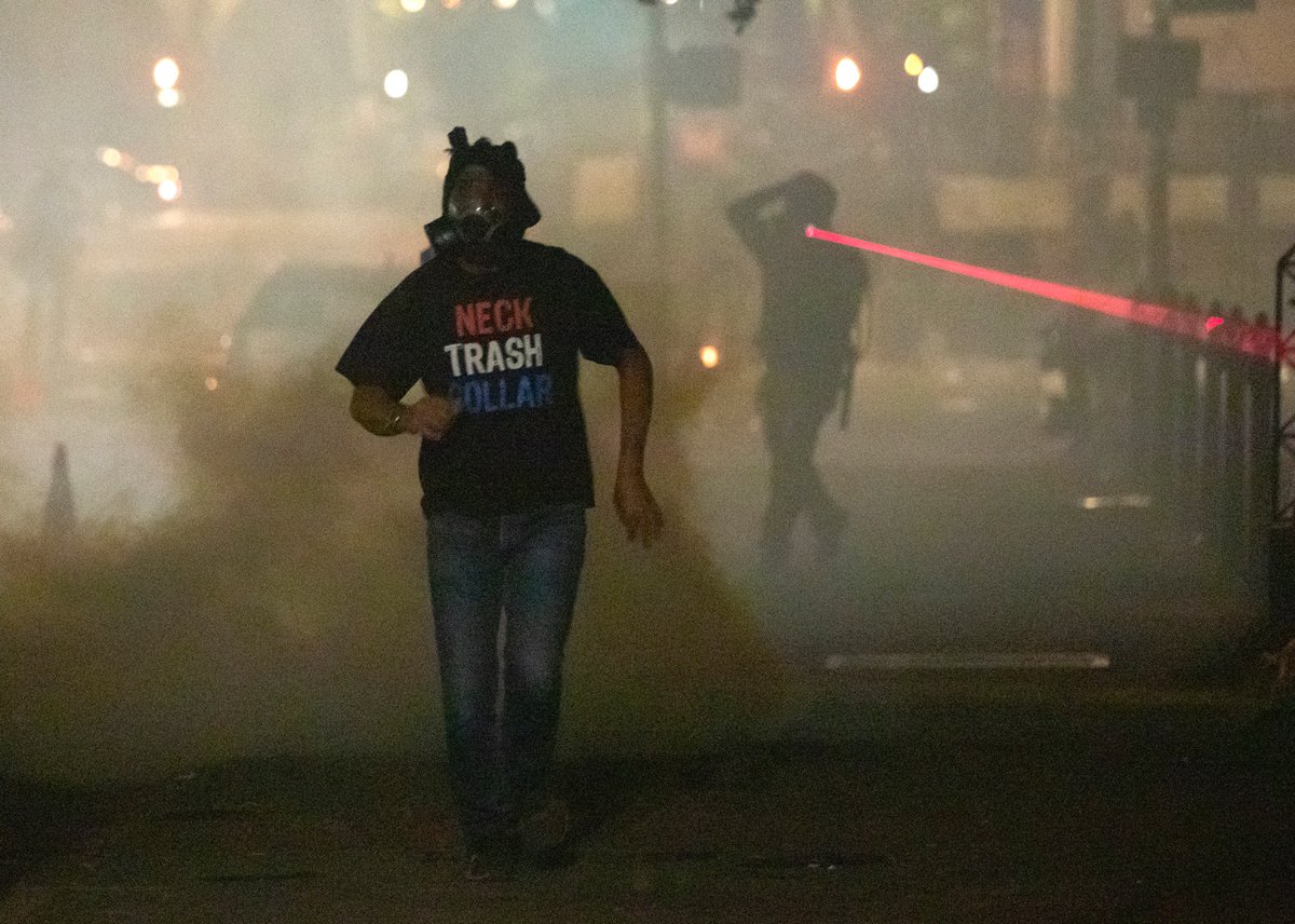This was the strongest show of force that I’ve seen. Tear gas canisters were shot out all over the place, along with other less than lethal munitions zipping through the crowd in a dark Lownsdale Square.