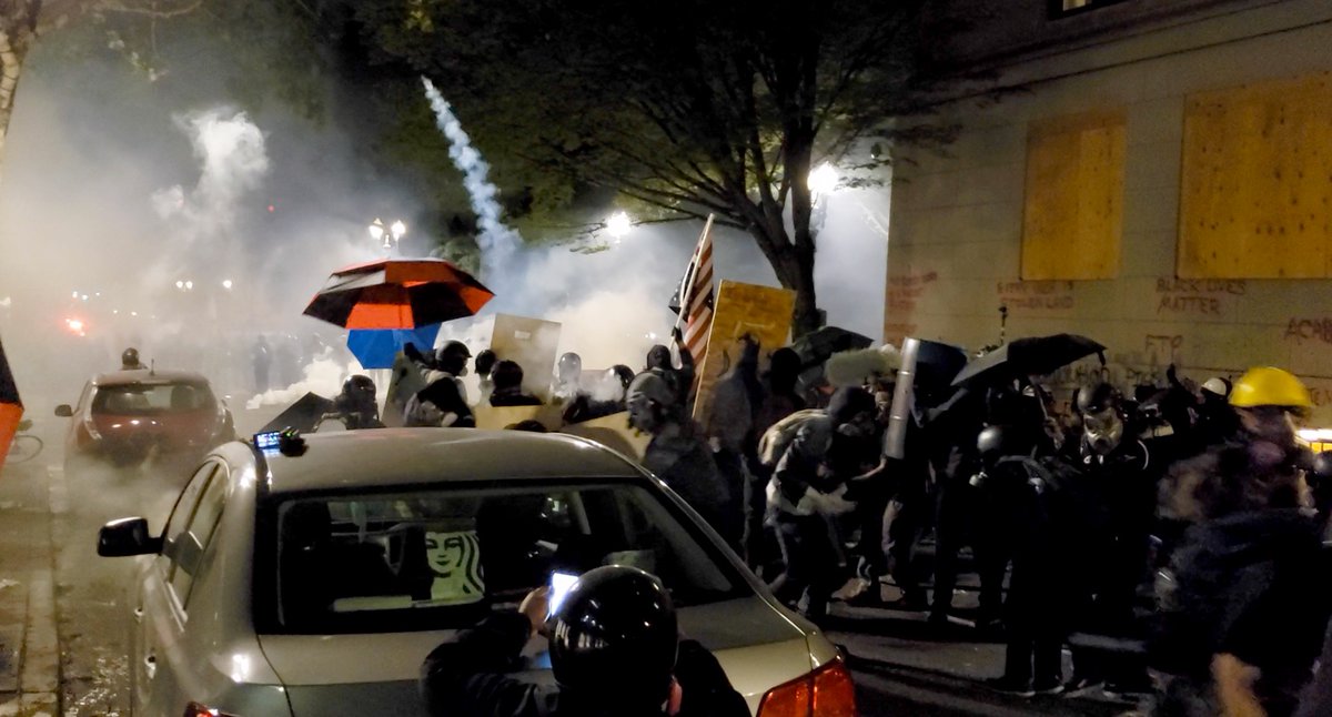 A standoff occurred on Main St. between 4th and 5th. More rubber bullets were shot into the mass. People took cover wherever they could. Like I mentioned last night, I was struck four times: body (2), wrist, and head. Two hit me at the end of this video  https://twitter.com/jonhouse_/status/1287312946389897216
