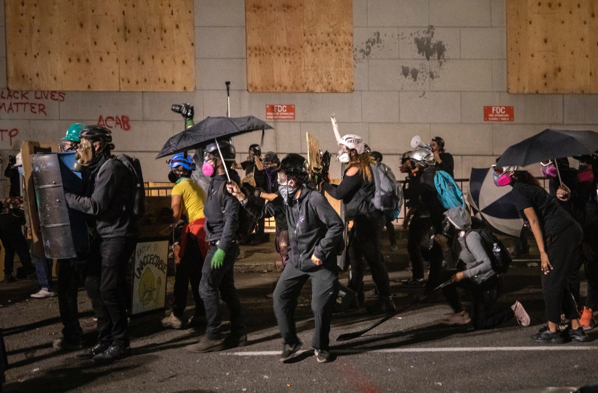 A standoff occurred on Main St. between 4th and 5th. More rubber bullets were shot into the mass. People took cover wherever they could. Like I mentioned last night, I was struck four times: body (2), wrist, and head. Two hit me at the end of this video  https://twitter.com/jonhouse_/status/1287312946389897216