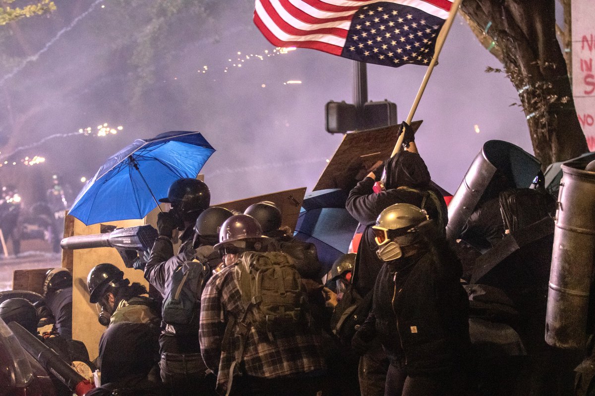 A standoff occurred on Main St. between 4th and 5th. More rubber bullets were shot into the mass. People took cover wherever they could. Like I mentioned last night, I was struck four times: body (2), wrist, and head. Two hit me at the end of this video  https://twitter.com/jonhouse_/status/1287312946389897216