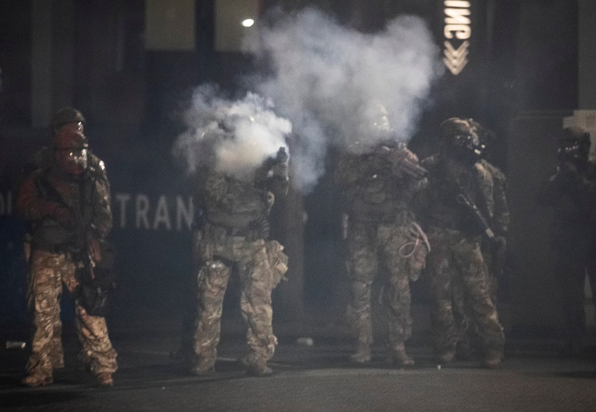 Federal agents continued to push forward with crowd control munitions. The second and third photos aren’t the cleanest, because I was taking cover against a tree as more munitions were being unloaded down 5th Ave., where I was standing.