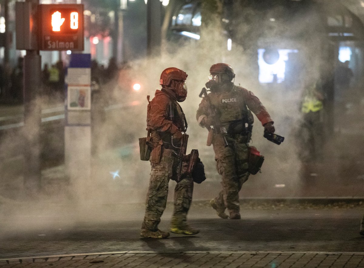 Federal agents continued to push forward with crowd control munitions. The second and third photos aren’t the cleanest, because I was taking cover against a tree as more munitions were being unloaded down 5th Ave., where I was standing.