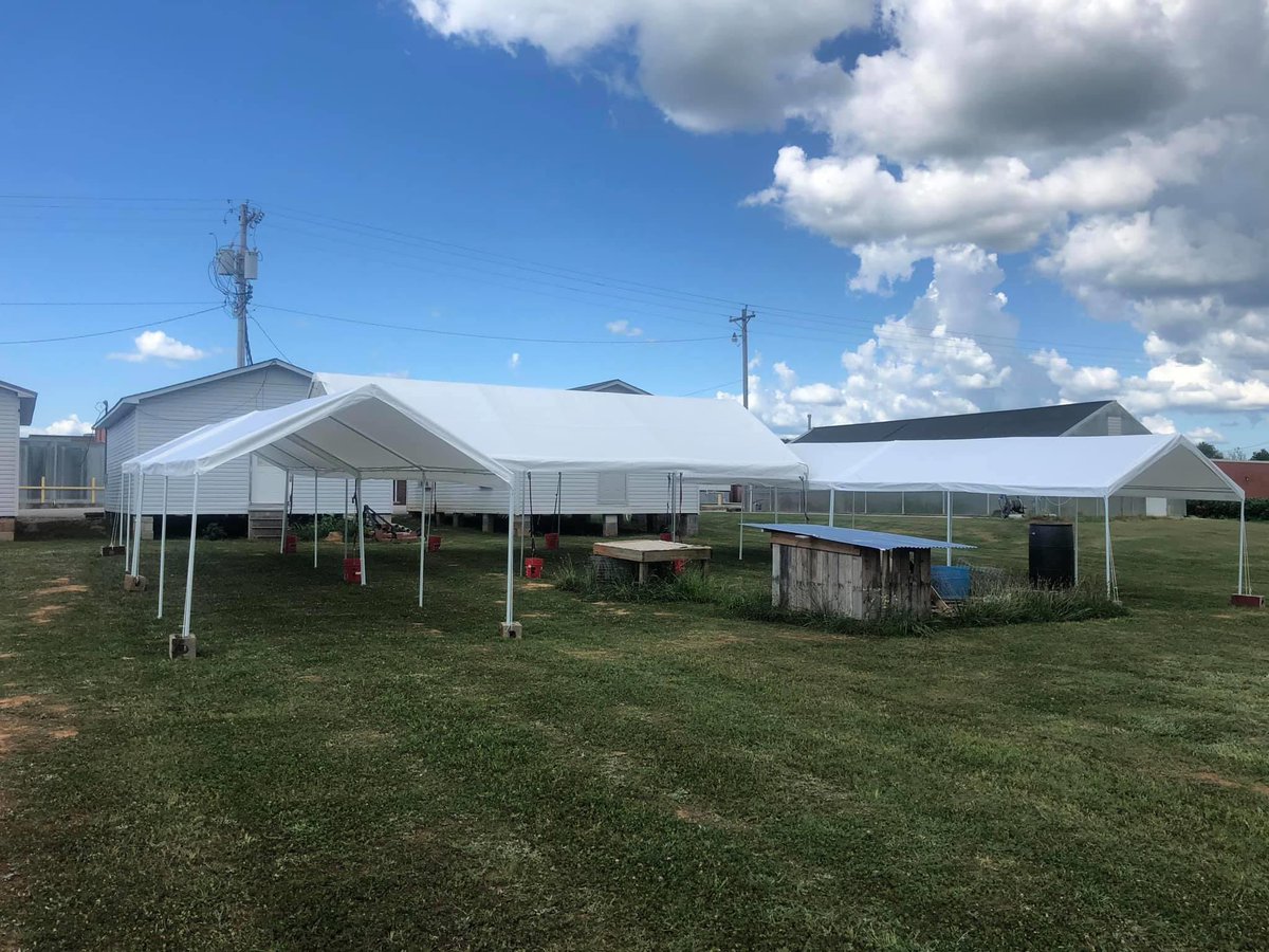 elimestoneband's tweet photo. We now have an outdoor band room! 
Thank you so much Jerry Green and Fairview Baptist Church for loaning AND setting up the big tent! Thank you band parents for buying the 4 other tents! SPECIAL, sweaty Thanks to the brave souls who helped set all of this up! You all are awesome! https://t.co/7fwVS1gXfL