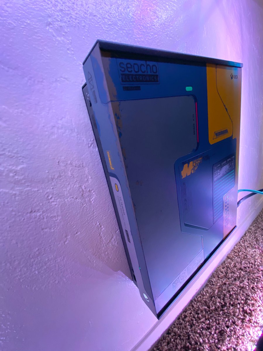 UrbodyTipsy2691's tweet photo. And more pics of my mounted Xbox One X Cyberpunk Limited Edition Console. @Xbox @CyberpunkGame @HIDEitMounts #Xbox #XboxOne #XboxOneX #hideitmounts #afterhideit #Microsoft #cyberpunk #LimitedEdition #console #twitch #twitchstreamer #twitchtv #STREAM #beautiful https://t.co/COZzf0PLvQ