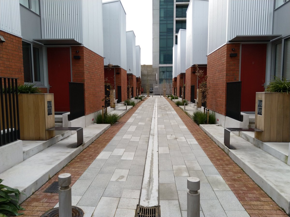 In terms of denser urbanism, there's a fair few apartments and terraced houses going in, especially on the fringes of the city centre. Some of them had great car-free alleyways for their front doors (6/15)