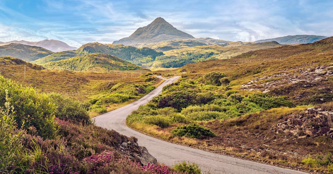 DreamEscapeLtd's tweet photo. The long and winding road. Something for your bucket list? The North Coast 500 route is waiting so let's get those wheels turning &amp; start planning this epic journey of a lifetime for you &amp; your family.   #scottishhighlands #benstack #nc500 #tailormade #experiences https://t.co/ZHMh9hS6Im