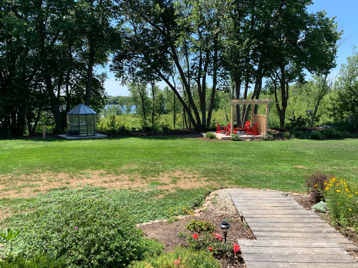 Thanks to customer Norm for sharing these updated photos of his deck &amp; pergola install. Looks like the perfect spot for a social distance visit by the water. Your landscaping &amp; chairs really finish the look of the cedar installation. We're so glad that you're enjoying it!🥰👍