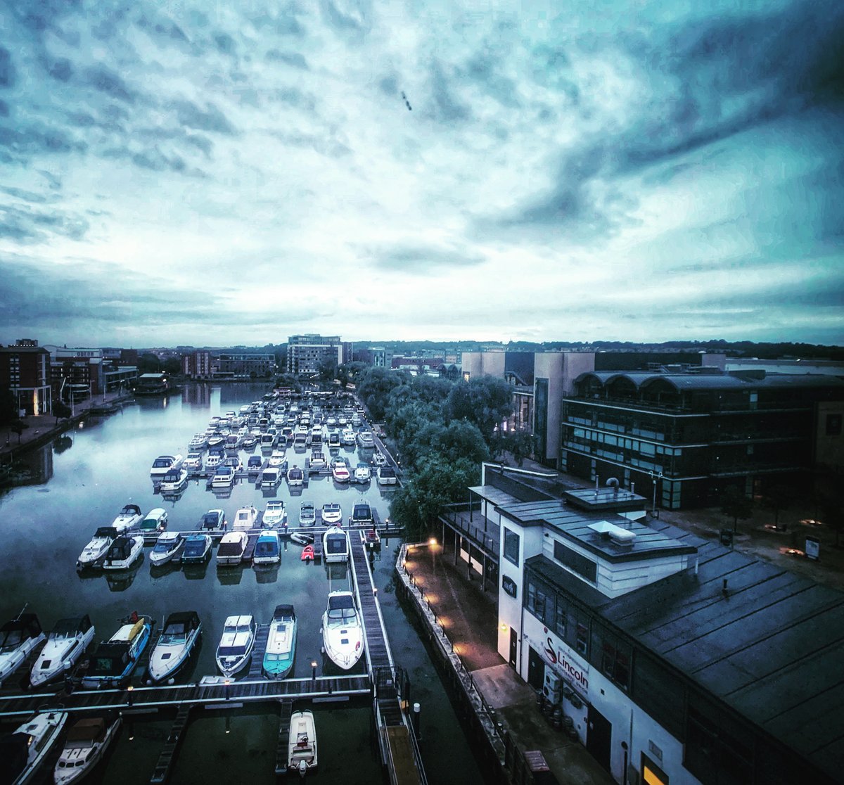 UoLAccomm's tweet photo. A cloudy start to the week on campus this morning. However, we still love this view 😍 #LoveLincoln #OurCampus #BrayfordPool #CygnetWharf #TheViewFromTheRoom https://t.co/CPLBztu66I
