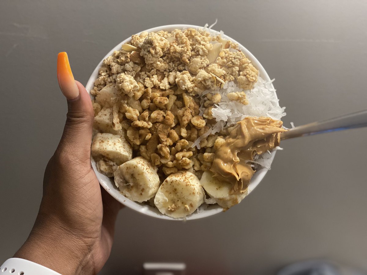 Oatmeal w/ brown sugar, bananas, coconut, vanilla almond granola, cinnamon walnuts & peanut butter