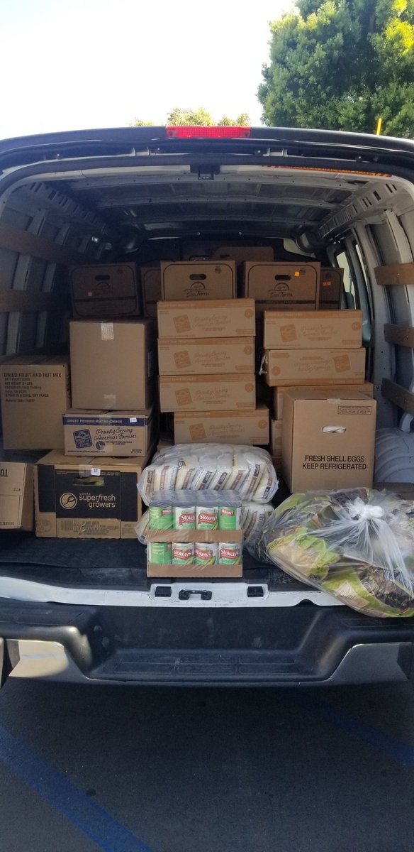 feeding_motion's tweet photo. Founder of Feeding (F.I.M.) in Motion Ms. Brenda Smith &amp; Gregory Rhea President of Tikkun Worldwide Charity @TikkunC unloading food boxes for distribution to families in need. To continue to grow the legacy of F.I.M. Ms. Brenda has asked Gregory to become the President of F.I.M. https://t.co/yrt1E27xLg