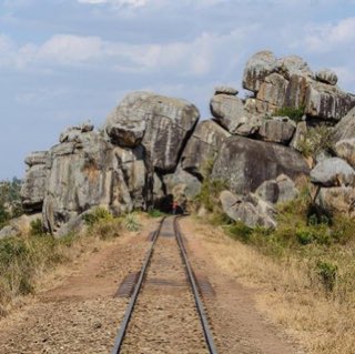 This high adrenaline view of a railway line going through a giant rock pile near Mwanza 😍 #wanderlust via @mfinanga_rama