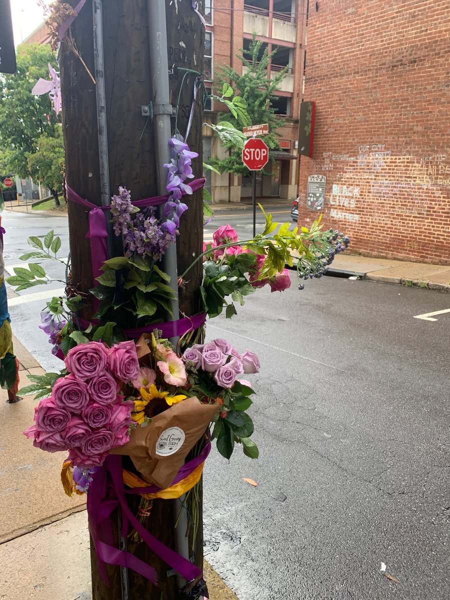 Jalane then took me to Heather Heyer Way, where the 32-year-old protester was killed almost exactly three years ago in a vehicle-ramming attack by a white supremacist in August 2017.Heather's favorite color was purple, which is why folks leave flowers like these at the scene.