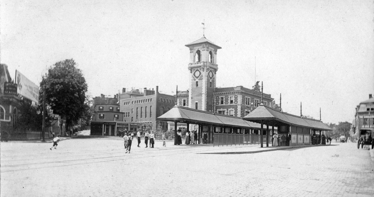 It wasn't always this way. Here's an image from when this corridor was still served by streetcars (this route is now the MBTA 66 bus). Still too much cobblestone, but at least transit riders got to wait in some shade, and the shops had awnings. (5/x)