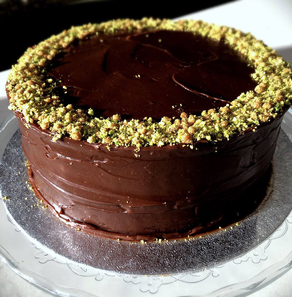 elthamjons's tweet photo. Our Chocolate Ganache, with Pistachio &amp; Salted Caramel Crumb. So glassy she could be an ambassador for @PanteneUK ! She’ll be waiting for you tomorrow @allinapickle_ #pantene #ganache #elthamjons https://t.co/qGV8KYaizq