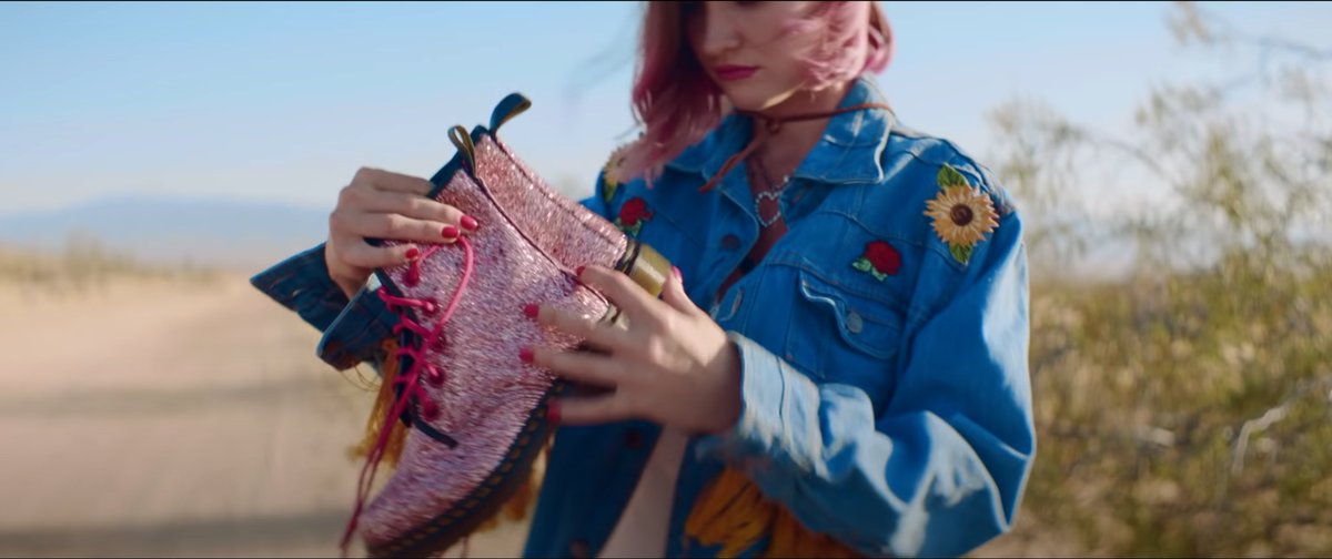 more nods to dorothy’s journey through oz can be found throughout the album. the ruby red “slippers” mandy wears in “the end” music video, the rainbow road as a play on the yellow brick road; a path with a destination of happiness. many more, honestly.