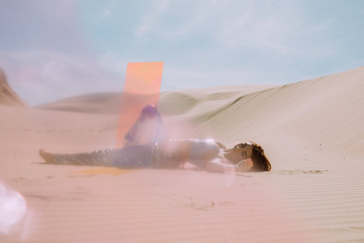 another key component of the imagery is the iridescent portal on the album cover. the doorway with poppies spilling out represents the other side of superbloom; growth, self-love, progress, and a glimmer of hope in a very dark place.