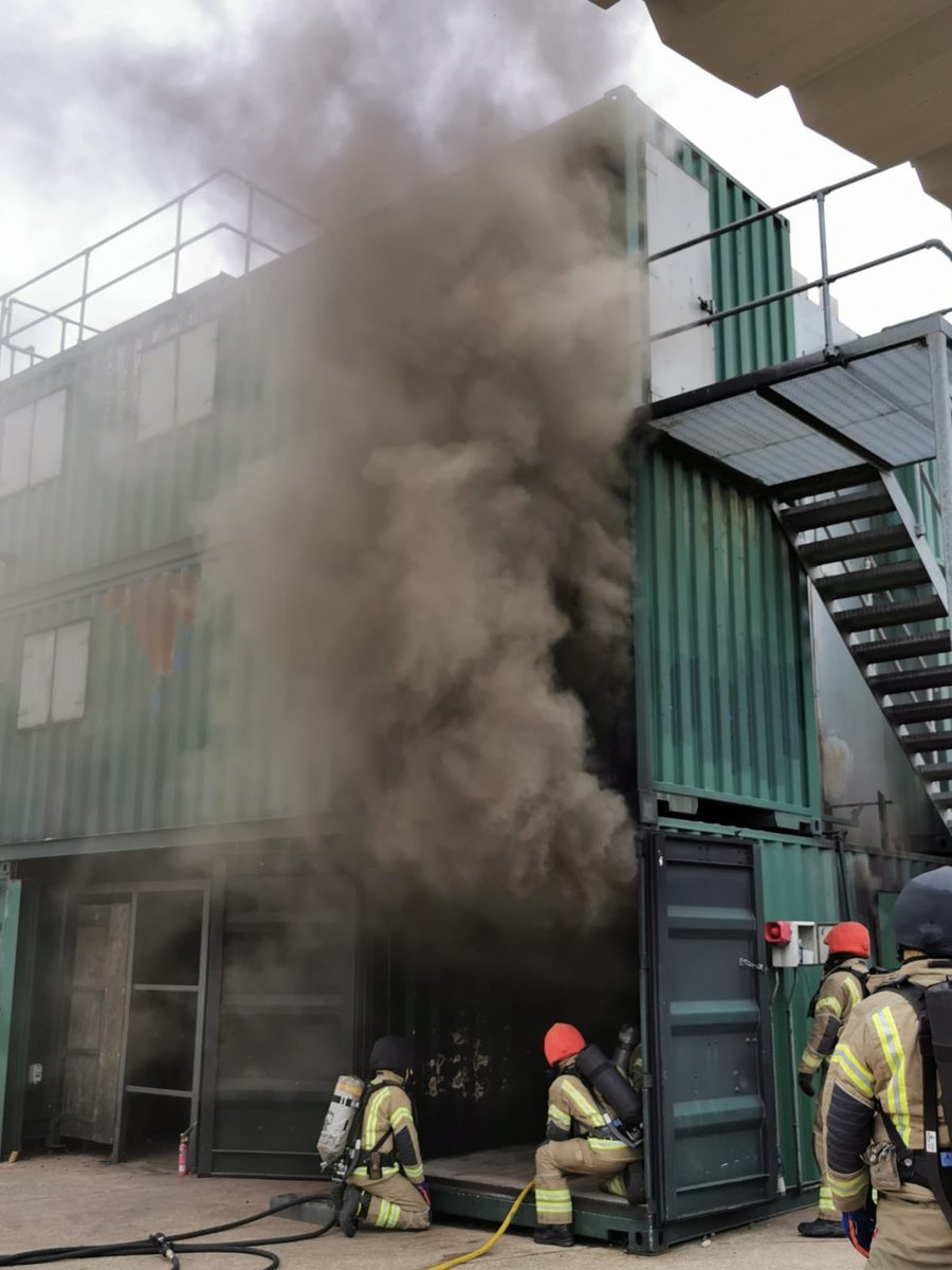 SFRSTraining's tweet photo. Great first day of BA Module 2 @SuffolkFire #FirePhenomenom #flashover #backdraught #fgi @BristolUniforms PPE keeping us safe and @GrantInstrument monitoring our temperatures. Demo sessions and first exposure to live fire training 👏🏼👏🏼👏🏼 Good Efforts all round https://t.co/W3ge0zSTt6