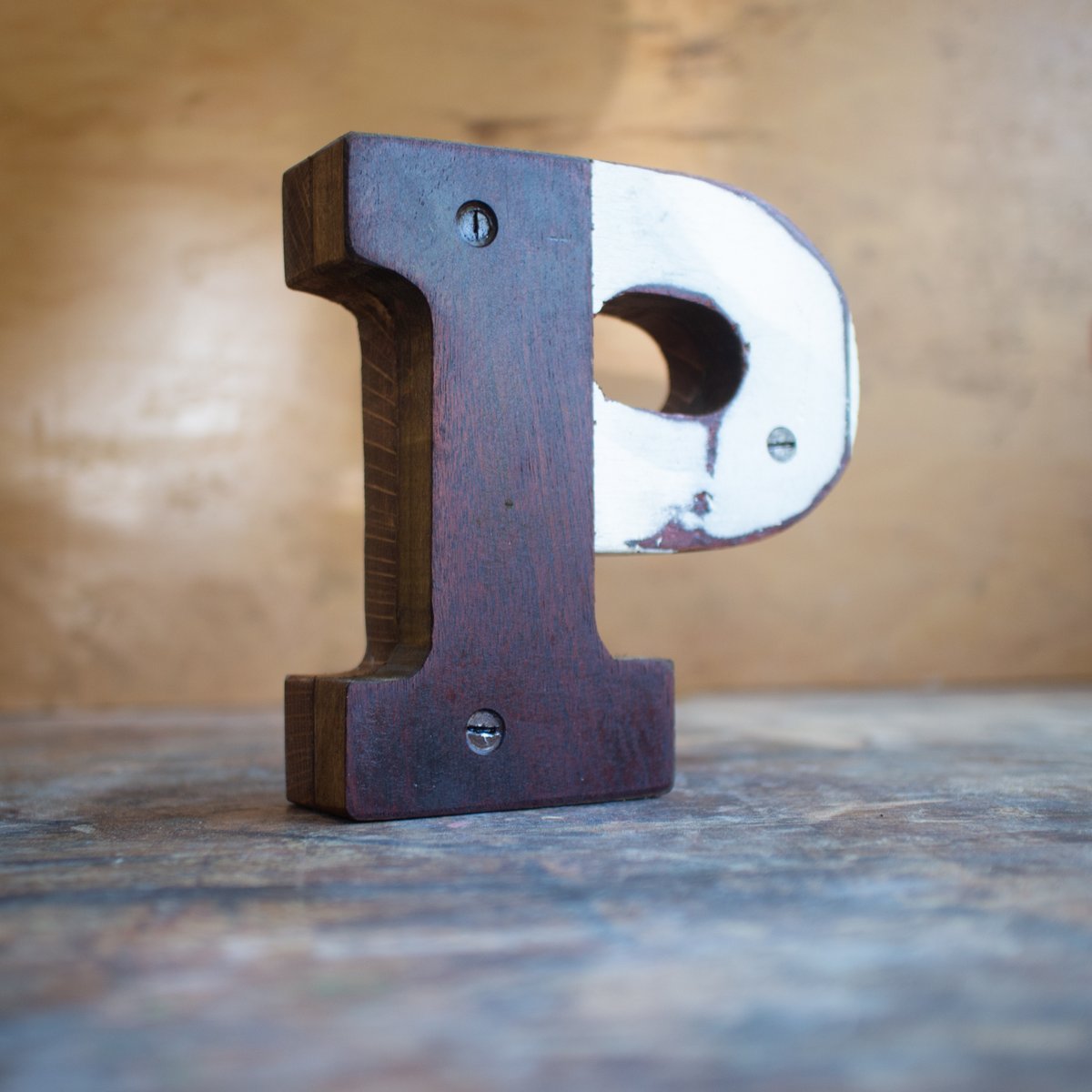 The letter P. Made from pianos 🎹