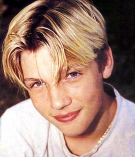 BSBFangirls's tweet photo. Continuing #NickWeek and getting ready for tomorrow, let's look at some more old pics of @nickcarter. Which do you like more?! https://t.co/O2tbSwiykB