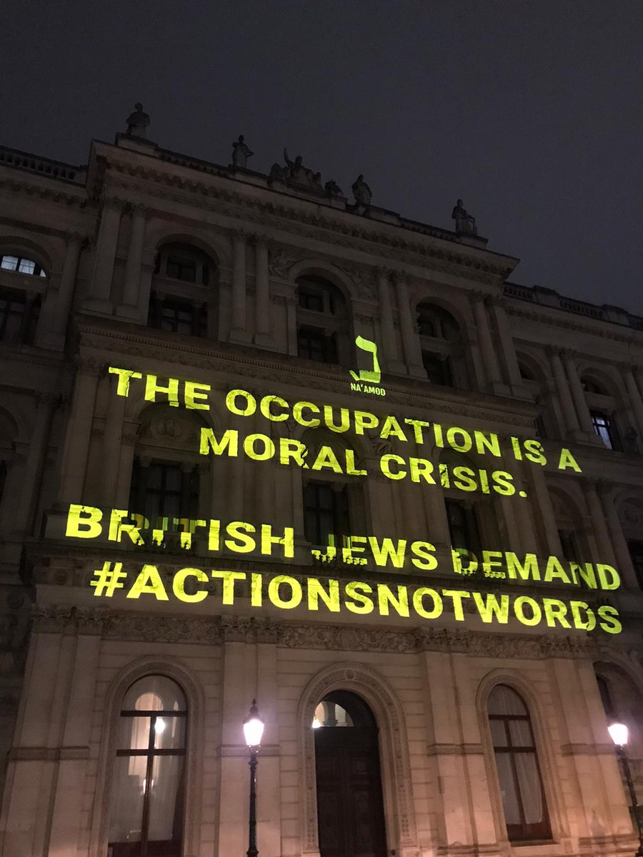 NaamodUK's tweet photo. We're now outside the 
@foreignoffice to send a message to the UK government from British Jews: 

There is no justice without freedom and equality for all Palestinians and Israelis. 

Annexation and occupation are a moral crisis, one that demands consequences. 

#ActionsNotWords https://t.co/waktSz34ou