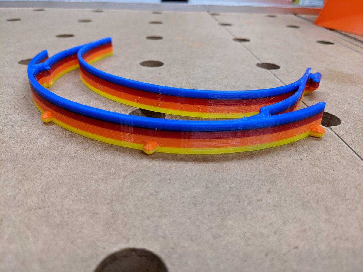sprior's tweet image. I'm using up some ends of filament spools to make one off face shields, I thought this one would look like a sunset.