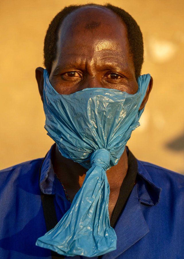 AfrikaGreen's tweet photo. A man wears a #plastic bag on his face as a precaution against the spread of the #coronavirus, on the street in Katlehong, east of Johannesburg, South Africa, May 6, 2020.
#africa
#southafrica
#2019novelcoronovirus
#coronovirus
#covid-19 https://t.co/MC5um1puvS