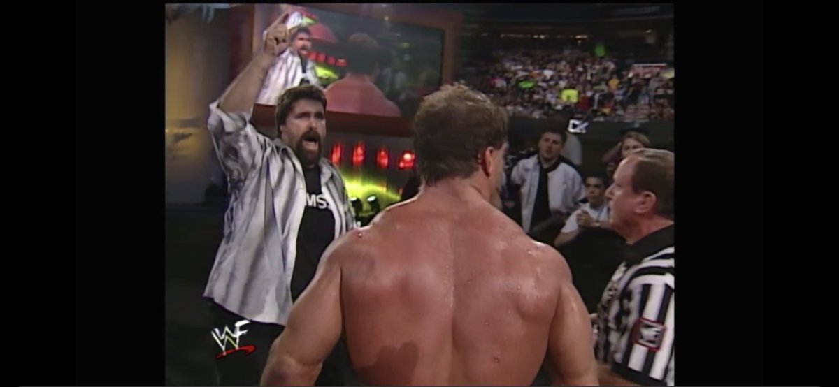 attitude_rewind's tweet photo. #ChrisBenoit is declared the @WWE #Champion in the #FatalFourWay match against @TheRock, @undertaker and @KaneWWE.
But #Commissioner @RealMickFoley overrules the decision because @undertakerβs leg was on the rope π
#Unforgiven2000 #AttitudeEra #AttitudeRewind https://t.co/OXqvHTbTYm