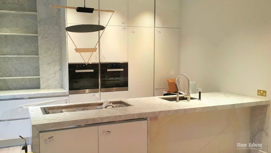 We love how this kitchen unit has been brought to life with a beautiful Carrara Marble bespoke top with mitred edge detail.
We are confident in this part of our production by using only the best masonry tools and machinery. #marbleworktop 
.
CONTACT>>> bit.ly/38TqSL8