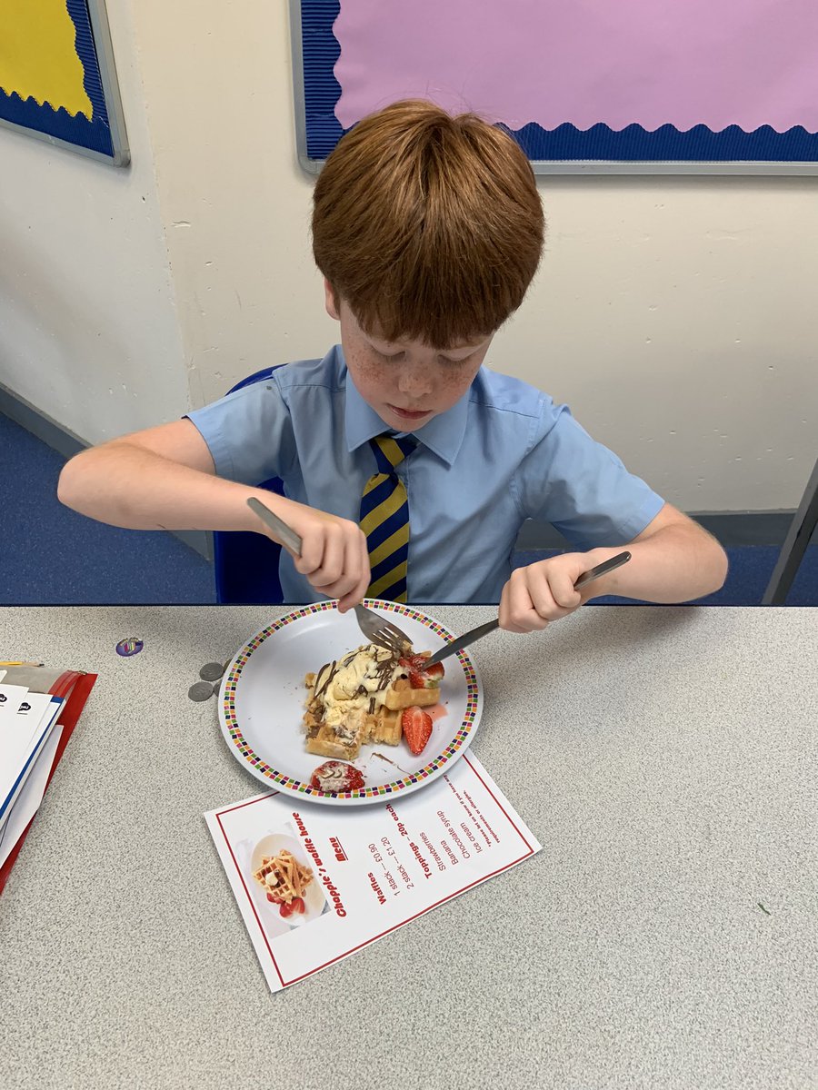 StJosephClass1's tweet photo. We learned how to order from a menu today and make sure that we received the correct change! We also practised using a knife and fork to show good dining manners! @StAnnesCPS @StJohntheApost1 @StJosephClass1 https://t.co/DvhBqPhqGu