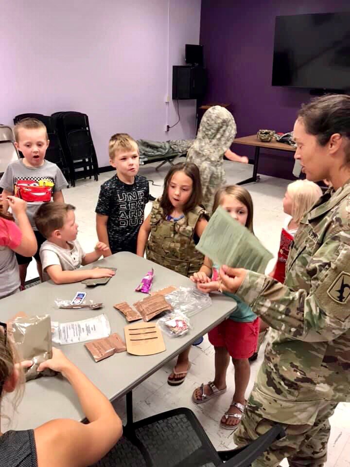 York_ParkandRec's tweet photo. On Tuesday, at Hometown Heroes, we got to learn all about the National Guard. The kids loved getting to try on the equipment and taste an MRE. They even worked together and put together a tent. #YPR #YorkParksAndRec https://t.co/uJubb7WIX6