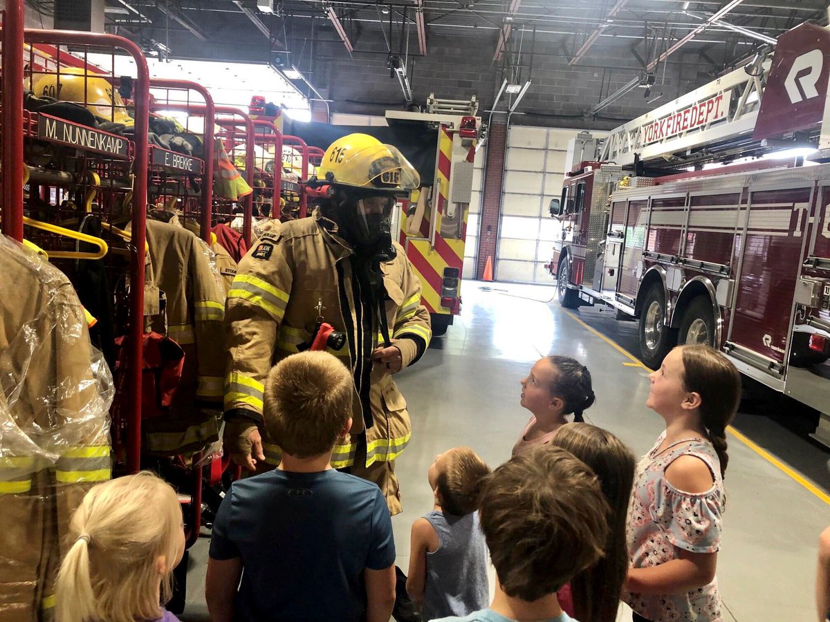 York_ParkandRec's tweet photo. The Hometown Heroes crew ventured across the street and visited the Fire Station. What a great Wednesday morning and thanks to York Fire Department! #YPR #YorkParksAndRec https://t.co/pYS66zxxIK