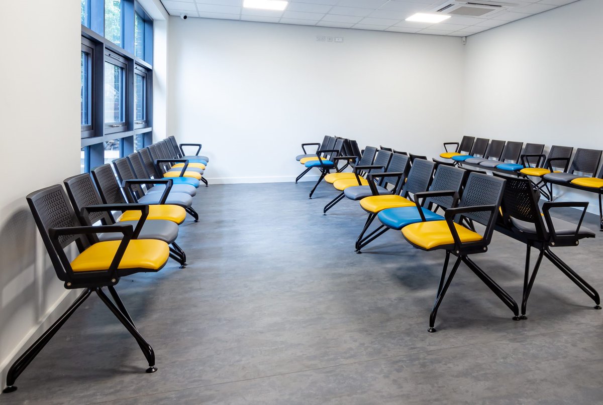 summit_1977's tweet photo. Versit #beamseating. Love the yellow seats and the randomly interspersed arms. This floor looks nice and level but the beam seat feet are adjustable just in case. #interiordesign #hospitalchair https://t.co/vPu9mCzhkH https://t.co/XoAHmYe5nI