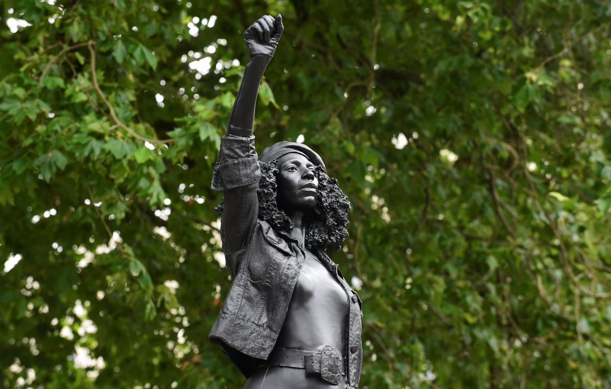 ajplus's tweet photo. A statue of a #BlackLivesMatter activist put up to replace one of a slave trader in Bristol was taken down by city council, about 24hrs later.

The council said it did not have approval and will be put in a museum, but said the activist, Jen Reid, is "a very impressive woman." https://t.co/PK5cn9RnK5