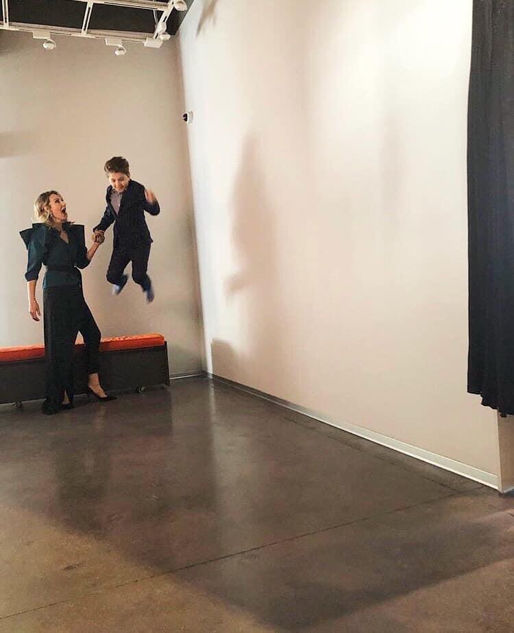 ShopSheLa's tweet photo. A behind the scenes picture 📸 from last years shoot for The Scout Guide 🥰🧡🧡🧡 Son jumping for joy w/ mom! Groove on over today &amp; tomorrow, 80% off everything in shop as we say farewell for now. #shopshela #shoplocal #omahaboutique #womensboutique #kidsboutique #omaha https://t.co/ChODBS5tO8