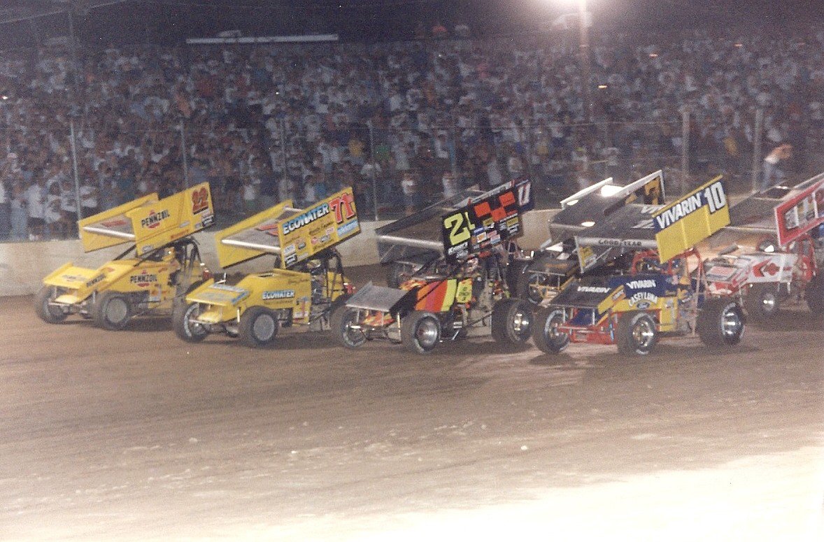 VntgSprintCars's tweet photo. Dave Blaney #10, Ed Lynch Jr. #2L, Kenny Jacobs #71M and Jac Haudenschild #22 lead the 4-wide parade lap before the start of the 1994 Kings Royal. Jac would go on to win the event for the second time in his career! https://t.co/pl9fyl9dvm